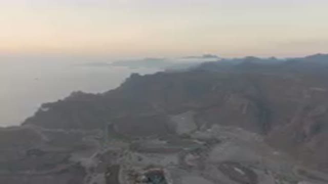 DANZANTE BAY LORETO BCS MEXICO-2023: Mountains With A City And A Body Of Water