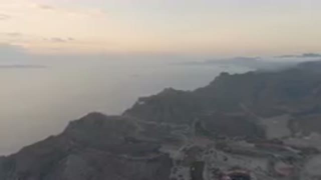 DANZANTE BAY LORETO BCS MEXICO-2023: Mountain With A Road And A Body Of Water