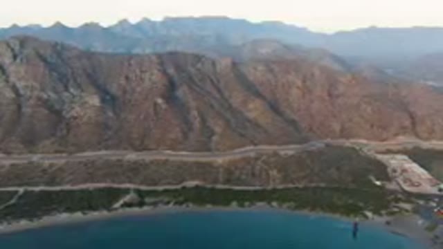 DANZANTE BAY LORETO BCS MEXICO-2023: Mountains And A Road In The Middle Of A Scenic Landscape