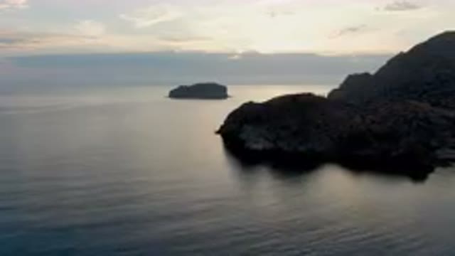 DANZANTE BAY LORETO BCS MEXICO-2023: Small Boat Floating on Calm Waters