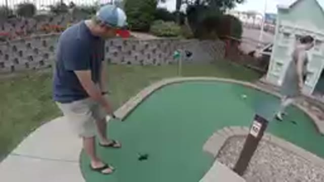 October 6, 2019. Denver, Colorado - Man Playing Miniature Golf