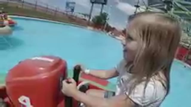 October 6, 2019. Denver, Colorado-Cute Little Girl Riding a Bumper Boat
