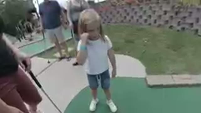 Oct. 6, 2019. Denver, Colorado-Curious Girl On Mini-Golf Course