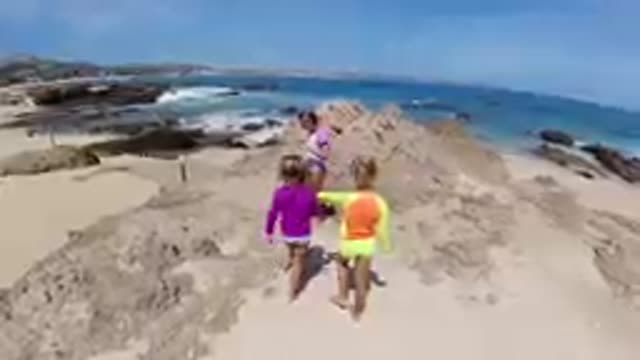 CABO BAJA CALIFORNIA SUR MEXICO-2019: Children Playing On Sandy Beach Dunes