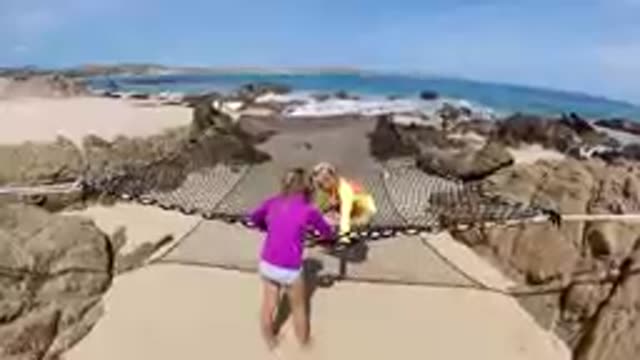 CABO BAJA CALIFORNIA SUR MEXICO-2019: Children Playing On Beach Safety Net