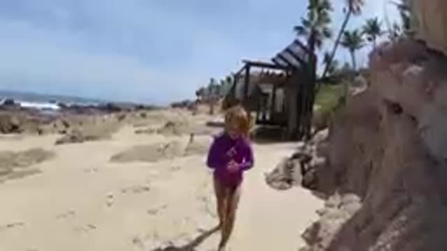 CABO BAJA CALIFORNIA SUR MEXICO-2019: Young Girl Running On Sandy Beach