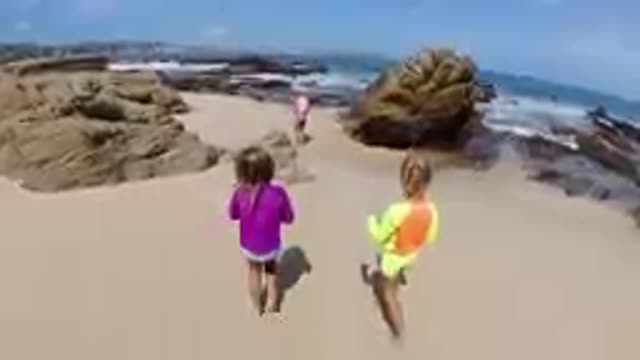 CABO BAJA CALIFORNIA SUR MEXICO-2019: Children Running On Sandy Beach