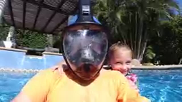 CABO BAJA CALIFORNIA SUR MEXICO-2019: Man Wearing Full Face Snorkel Mask In Pool