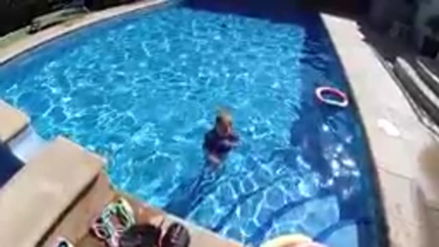 CABO BAJA CALIFORNIA SUR MEXICO-2019: Child Swimming In Outdoor Pool