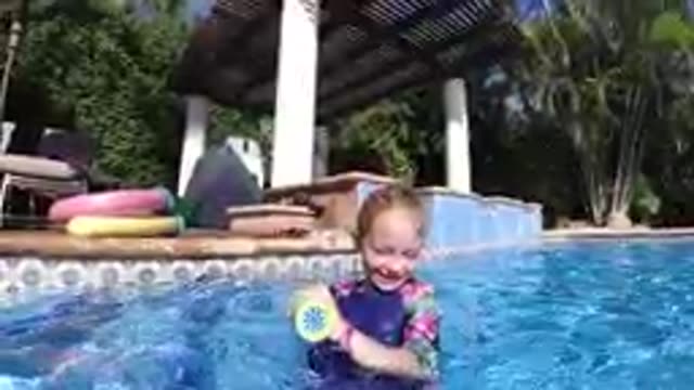 CABO BAJA CALIFORNIA SUR MEXICO-2019: Toddler Girl Playing With Toy In Pool
