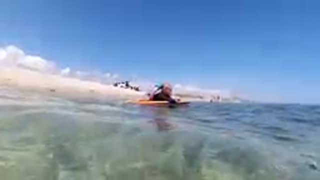 Cute Kids Floating on the Sea