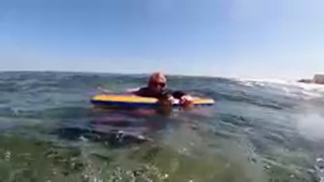 CABO BAJA CALIFORNIA SUR MEXICO-2019: Surfer Paddling On Board In Ocean