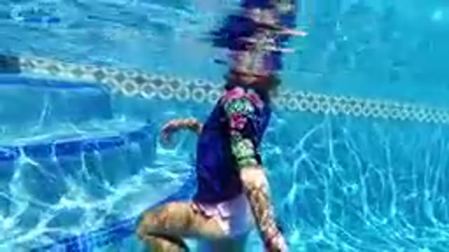 CABO BAJA CALIFORNIA SUR MEXICO-2019: Woman Swimming Underwater In Pool