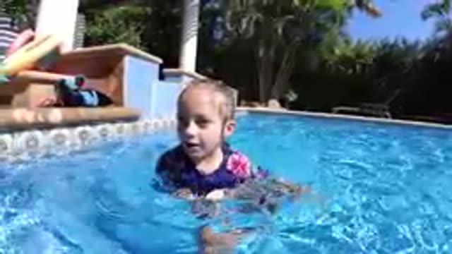 CABO BAJA CALIFORNIA SUR MEXICO-2019: Little Girl Splashing In Swimming Pool