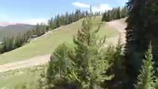 View Of A Mountain With A Trail Going Up It
