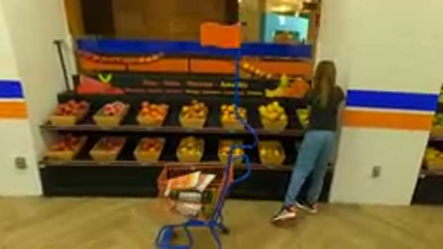 MEXICO CITY MEXICO-Aug. 30, 2023- Child Shopping For A Lot Of Bananas