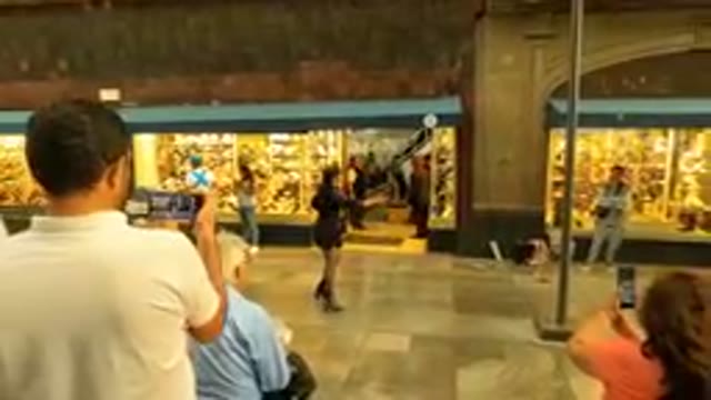 MEXICO CITY MEXICO-August 2023: People Filming A Street Performer