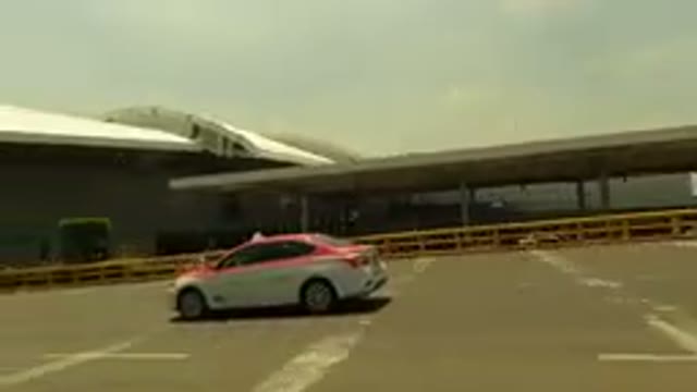 MEXICO CITY MEXICO-2023: Taxi Arriving at Airport Terminal