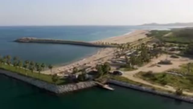 PUERTO LOS CABOS BCS MEXICO-2023: Aerial Beach And Pier With Boat In The Ocean