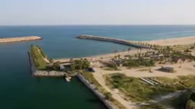 PUERTO LOS CABOS BCS MEXICO-2023: Aerial Beach And Pier With Boat In The Ocean