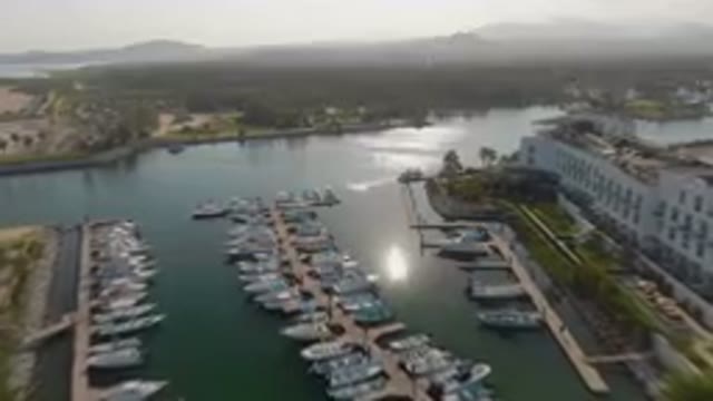 PUERTO LOS CABOS BCS MEXICO-2023: Boats Docked at Marina Near Luxury Resort