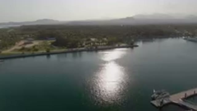 PUERTO LOS CABOS BCS MEXICO-2023: Boat Going Down the River in Scenic Waters