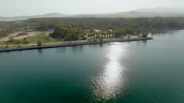 PUERTO LOS CABOS BCS MEXICO-2023: Body Of Water With A Small Island In The Middle