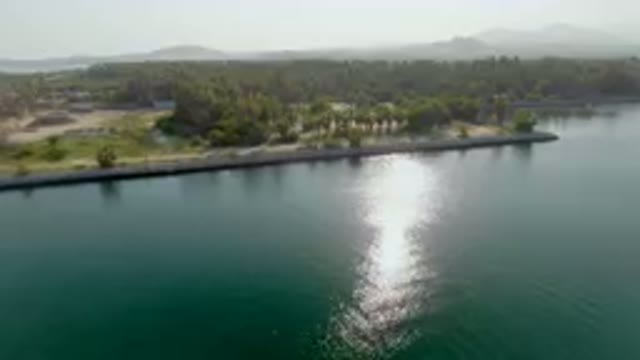 PUERTO LOS CABOS BCS MEXICO-2023: Body Of Water With A Small Island In The Middle