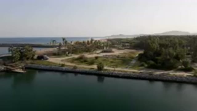 PUERTO LOS CABOS BCS MEXICO-2023: Small Island With A Boat In The Water