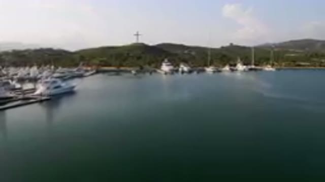 PUERTO LOS CABOS BCS MEXICO-2023: Boats Are Docked In A Large Body Of Water Near