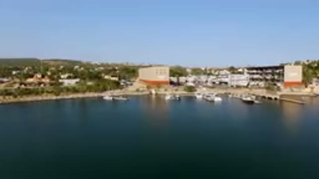 PUERTO LOS CABOS BCS MEXICO-2023: Large Body Of Water With Boats In It