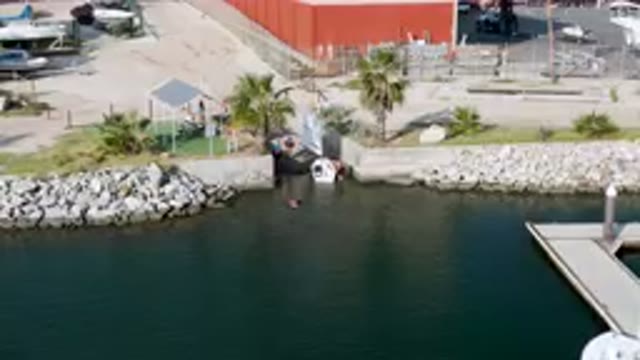 PUERTO LOS CABOS BCS MEXICO-2023, Jan 27-: Family Playing Around a Sailboat at Marina