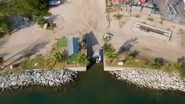 PUERTO LOS CABOS BCS MEXICO-2023: Aerial Boat Dock With A Boat Docked In The