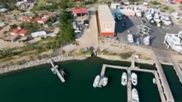 PUERTO LOS CABOS BCS MEXICO-2023: Boats Docked At A Marina In A Small Town With