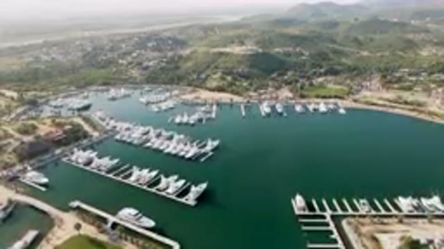 PUERTO LOS CABOS BCS MEXICO-2023: Marina With Boats Docked In The Water