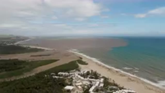 SAN JOSE DEL CABO BCS MEXICO-2023: Aerial Beach And A Body Of Water With A Beach