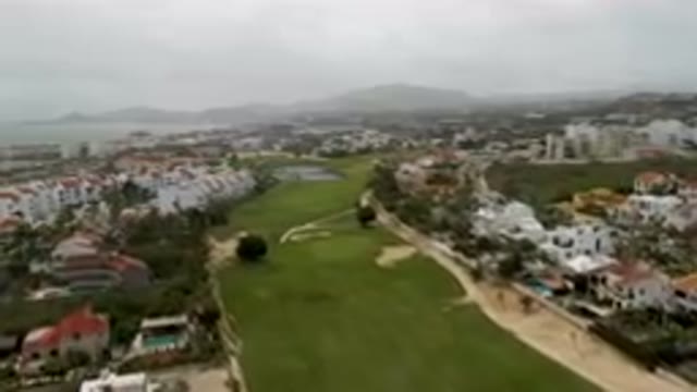 SAN JOSE DEL CABO BCS MEXICO-2023: Aerial Golf Course With A Lake And Scenic Surroundings