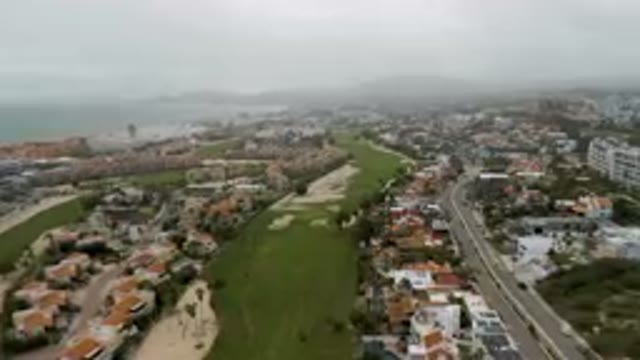 SAN JOSE DEL CABO BCS MEXICO-2023: Aerial Golf Course And A City With A Beach