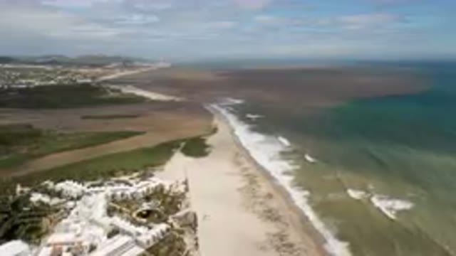 SAN JOSE DEL CABO BCS MEXICO-2023: Aerial Beach And Ocean With A White Building