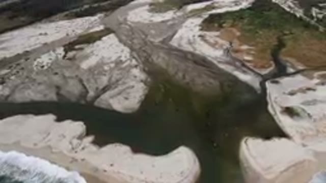 SAN JOSE DEL CABO BCS MEXICO-2023: Aerial River Flowing Through A Valley With A