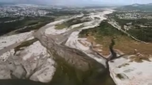 SAN JOSE DEL CABO BCS MEXICO-2023: Aerial River Running Through A Valley With A