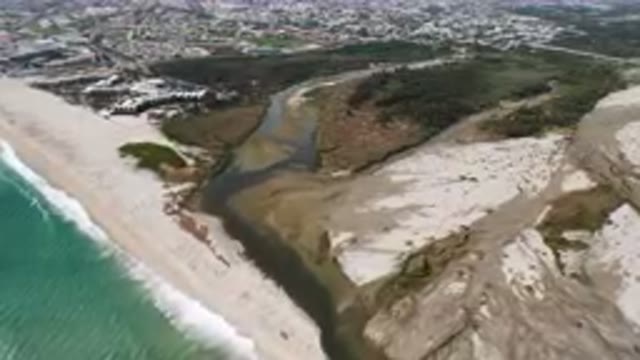 SAN JOSE DEL CABO BCS MEXICO-2023: Aerial Beach And River Running Through Sand Banks