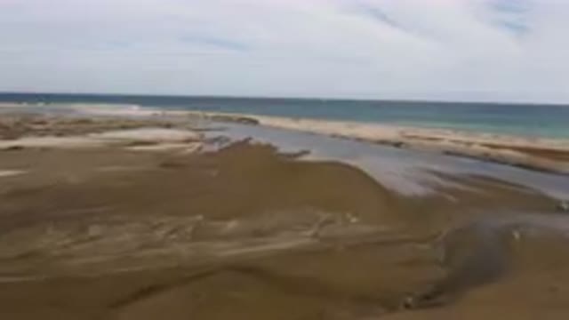 SAN JOSE DEL CABO BCS MEXICO-2023: Small Stream Of Water Running Through The Sand Banks
