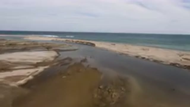 SAN JOSE DEL CABO BCS MEXICO-2023: Small Stream Of Water Running Through The Sand Banks