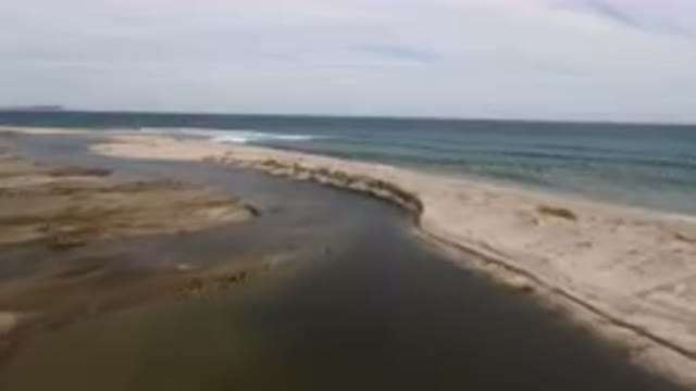 SAN JOSE DEL CABO BCS MEXICO-2023: Small Stream Of Water Running Through The Sand Banks