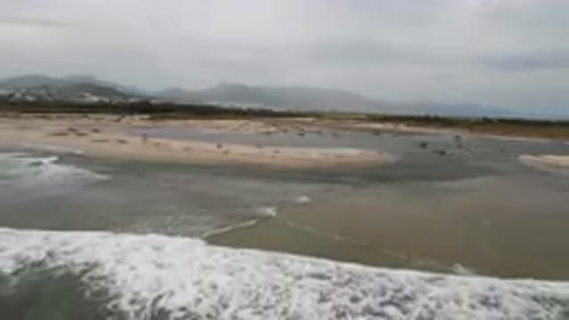 SAN JOSE DEL CABO BCS MEXICO-2023: Large Body Of Water With A Beach And Mountains