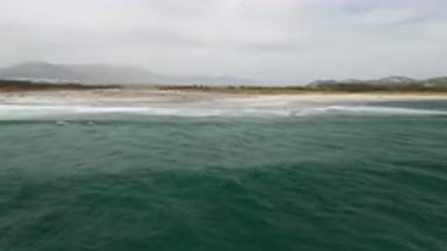 SAN JOSE DEL CABO BCS MEXICO-2023: Surfers Are Riding The Waves In The Ocean On