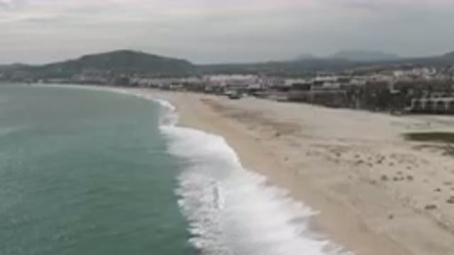 SAN JOSE DEL CABO BCS MEXICO-2023: Beach With A Lot Of Sand And Water