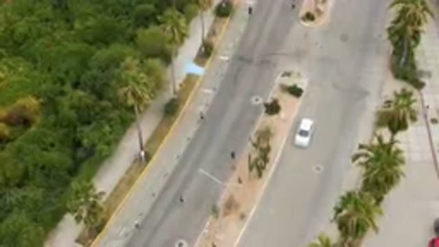 SAN JOSE DEL CABO BCS MEXICO-2023: Aerial Street With Cars And Palm Trees In The