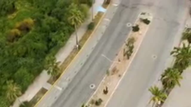 SAN JOSE DEL CABO BCS MEXICO-2023: Aerial Street With A Car Driving Down It